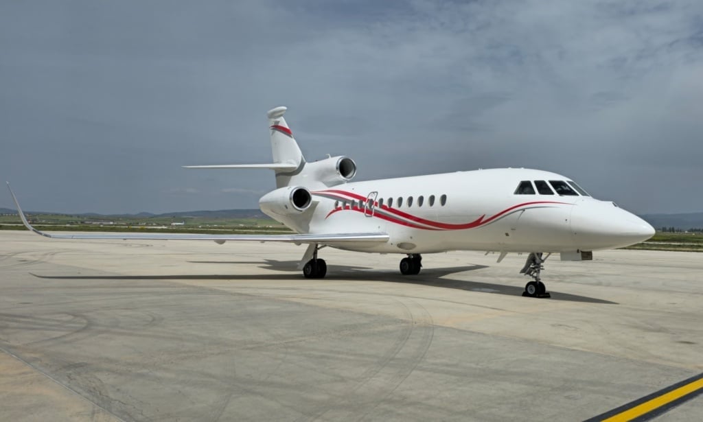 Dassault Falcon 900LX business jet on the ramp, ready for a private jet charter in Asia