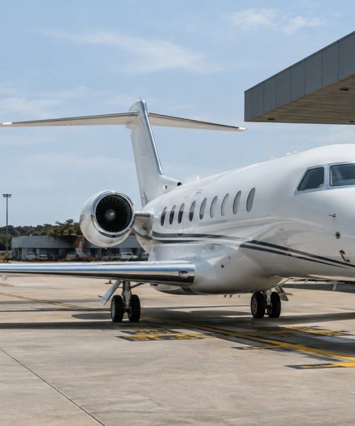 Business jet parked outside a private FBO terminal at an Asian business aviation airport